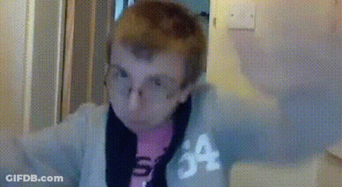 Woman In Glasses And Pink Shirt With Letter A GIF