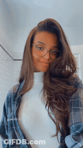 Woman In Glasses And Plaid Shirt Saying Grateful GIF