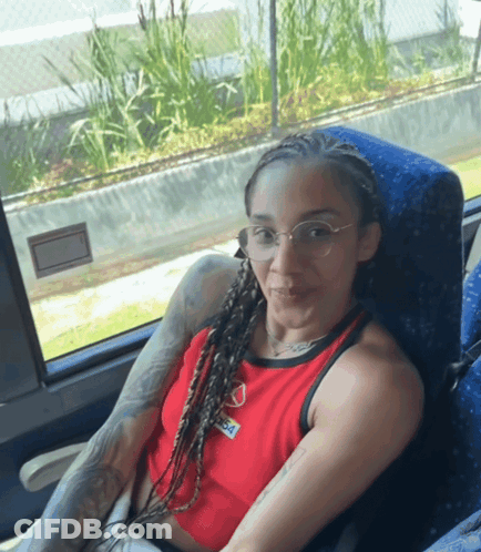 Woman In Glasses And Red Coca Cola Tank Top GIF