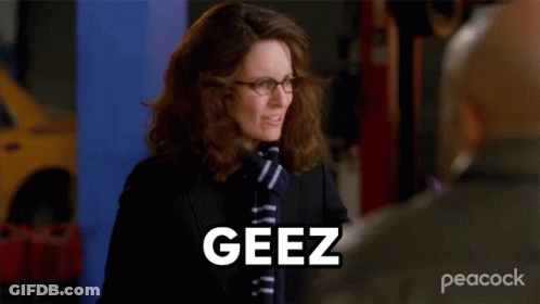 Woman In Glasses And Scarf Saying Geez To Man GIF