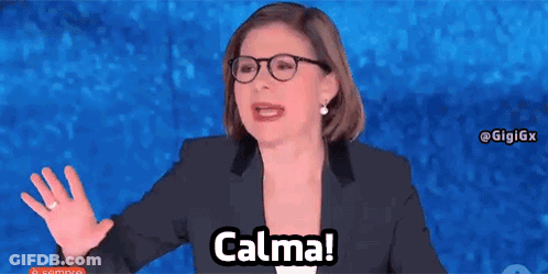 Woman In Glasses And Suit Saying Calma GIF