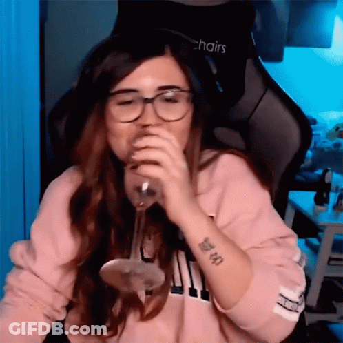 Woman In Glasses Drinking From Glass Sitting In Chairs Chair GIF
