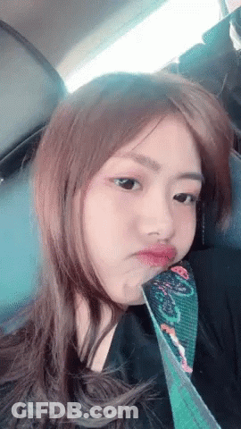 Woman In Glasses Hand On Chin GIF