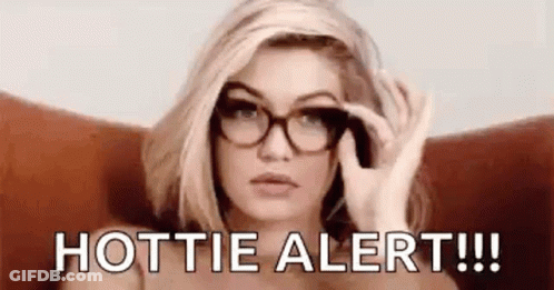 Woman In Glasses Holding Glasses GIF