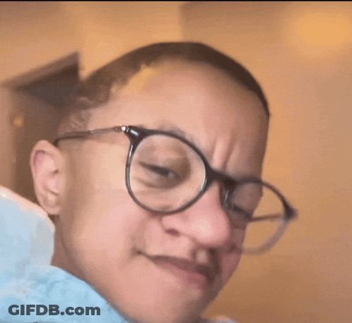 Woman In Glasses Making A Face GIF