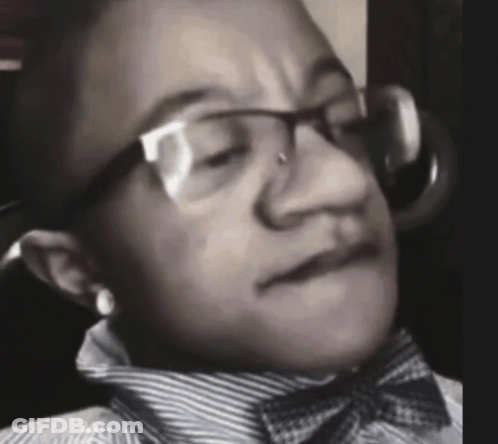 Woman In Glasses Making A Face GIF