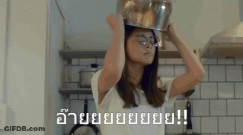 Woman In Glasses Making Funny Face GIF
