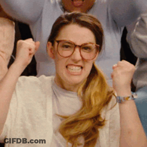 Woman In Glasses Raising Fist GIF