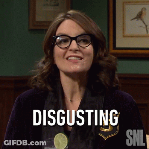 Woman In Glasses Says Disgusting In Front Of Picture GIF