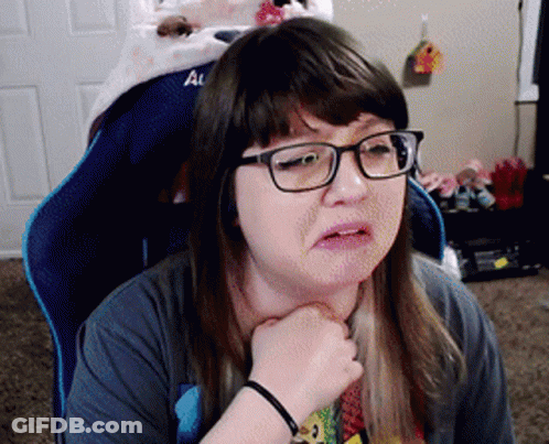 Woman In Glasses Sitting In Chair Saying Al GIF
