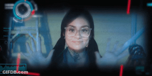 Woman In Glasses Smiling At I'm A Robot Screen GIF