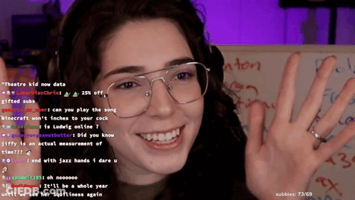 Woman In Glasses Smiling At Theatre Kid Now Data Board GIF
