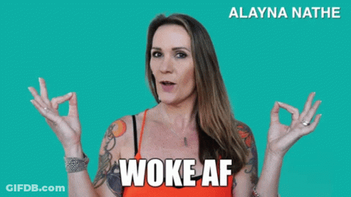 Woman In Glasses With Woke Book GIF