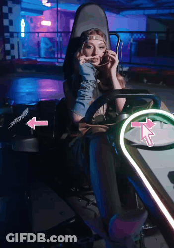 Woman In Go Kart With Pink Arrow Right GIF