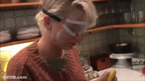 Woman In Goggles Holding Banana GIF