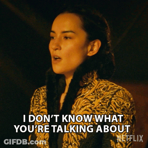 Woman In Gold Coat Says I Don't Know GIF