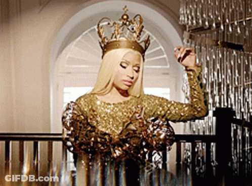 Woman In Gold Dress And Crown GIF