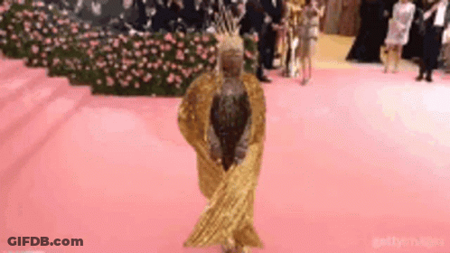 Woman In Gold Dress Dancing GIF