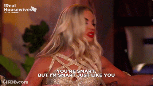Woman In Gold Dress Saying You're Smart GIF