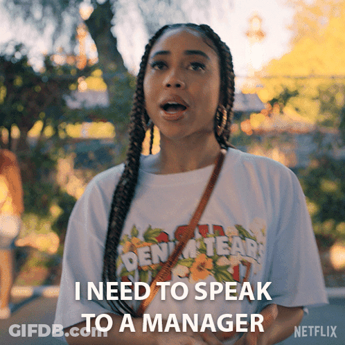 Woman In Golden Tears T-Shirt Talking To Manager On Netflix GIF