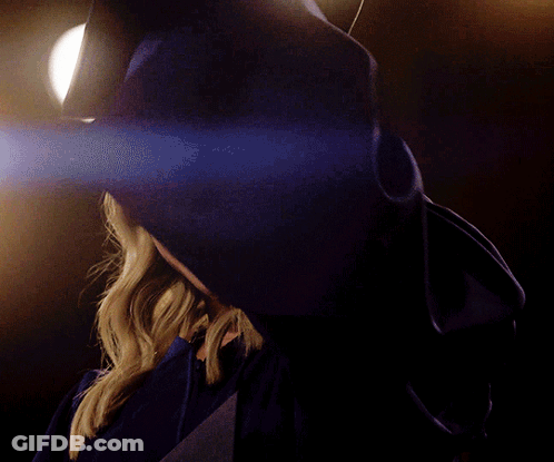 Woman In Graduation Cap And Gown GIF