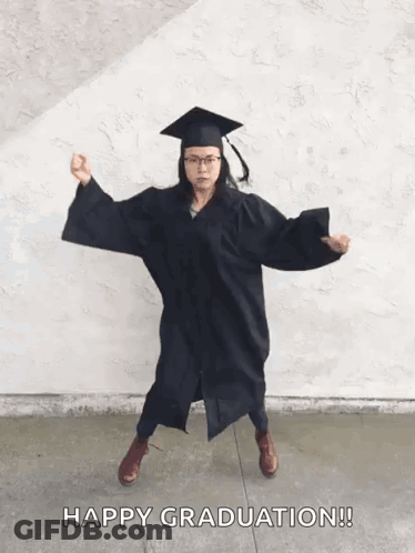 Woman In Graduation Cap And Gown Dancing GIF