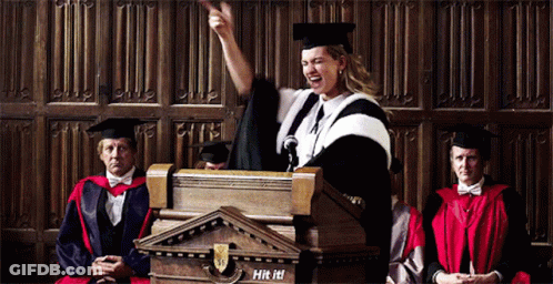 Woman In Graduation Cap And Gown Giving Speech GIF