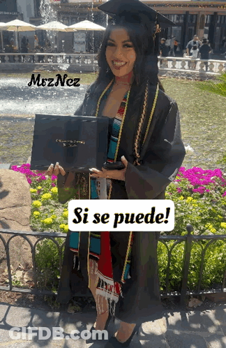 Woman In Graduation Cap And Gown Holds Diploma GIF