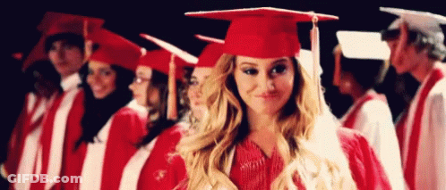 Woman In Graduation Cap And Gown GIF