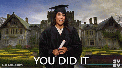 Woman In Graduation Cap And Gown GIF