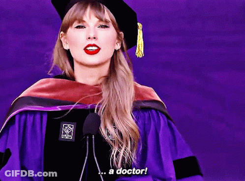 Woman In Graduation Cap And Gown Saying A Doctor GIF