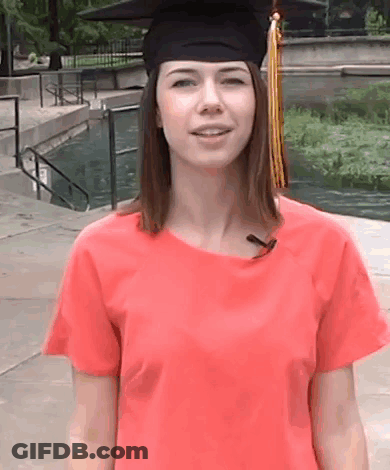 Woman In Graduation Cap And Gown Smiling GIF