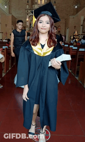 Woman In Graduation Cap And Gown GIF