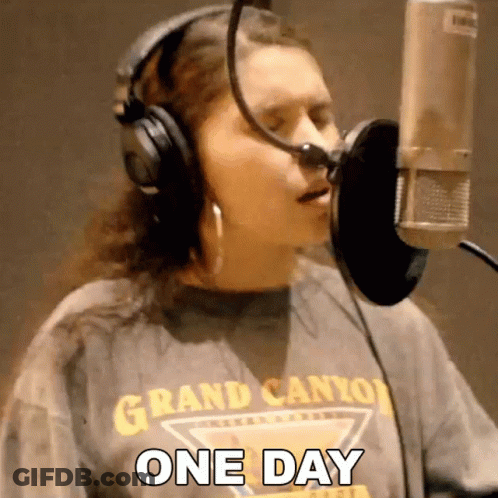 Woman In Grand Canyon Shirt Singing One Day GIF