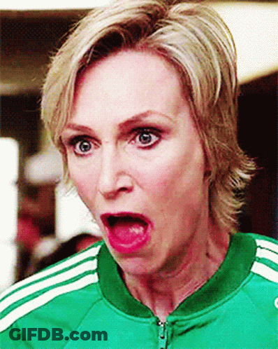 Woman In Green Adidas Jacket Surprised GIF