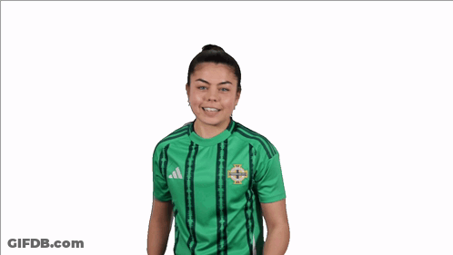 Woman In Green Adidas Shirt Making A Face GIF