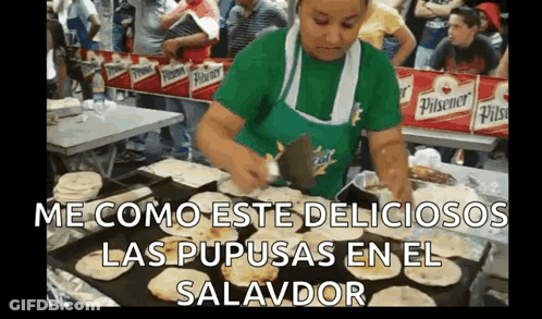 Woman In Green Apron Cooking Tortillas GIF