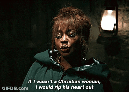 Woman In Green Cape Saying If I Wasn't A Christian Woman I Would Rip His Heart Out GIF