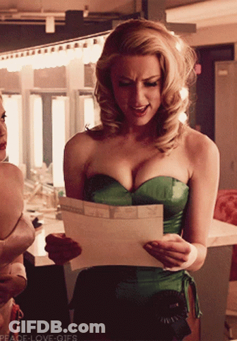 Woman In Green Corset Reading Letter GIF