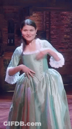 Woman In Green Dress Dancing On Stage GIF