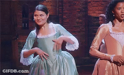 Woman In Green Dress Dancing On Stage GIF