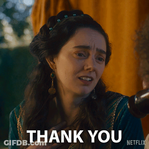Woman In Green Dress Giving Thanks GIF