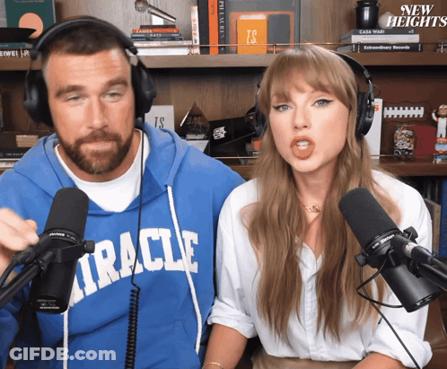 Woman In Green Dress Holding Hands With Man In White Shirt GIF