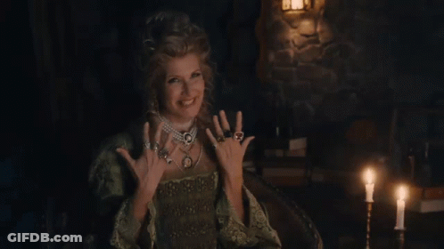 Woman In Green Dress In Candlelit Room GIF