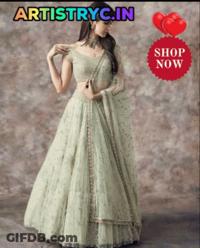 Woman In Green Dress In Front Of Artistry Sign GIF