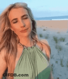 Woman In Green Dress On Beach GIF