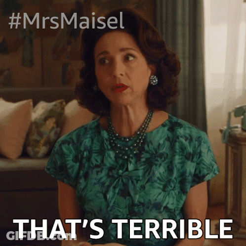 Woman In Green Dress Saying That's Terrible GIF