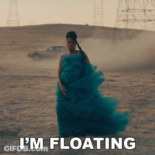Woman In Green Dress Says I'm Floating In Front Of Car GIF