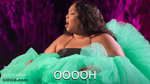 Woman In Green Dress Says Oooh GIF