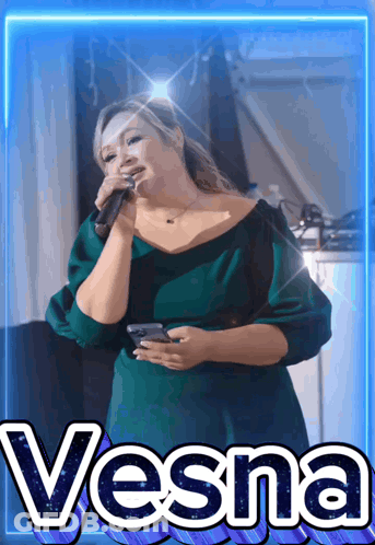 Woman In Green Dress Singing Into Microphone Vesna GIF